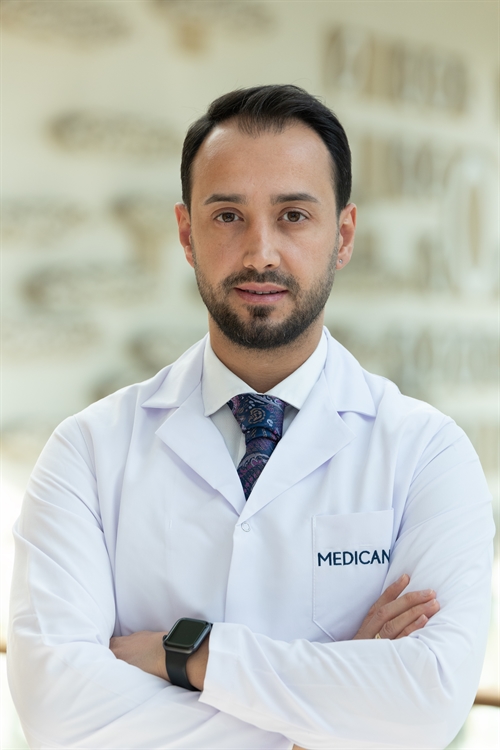 Dr. Erhan Hüseyin Cömert  