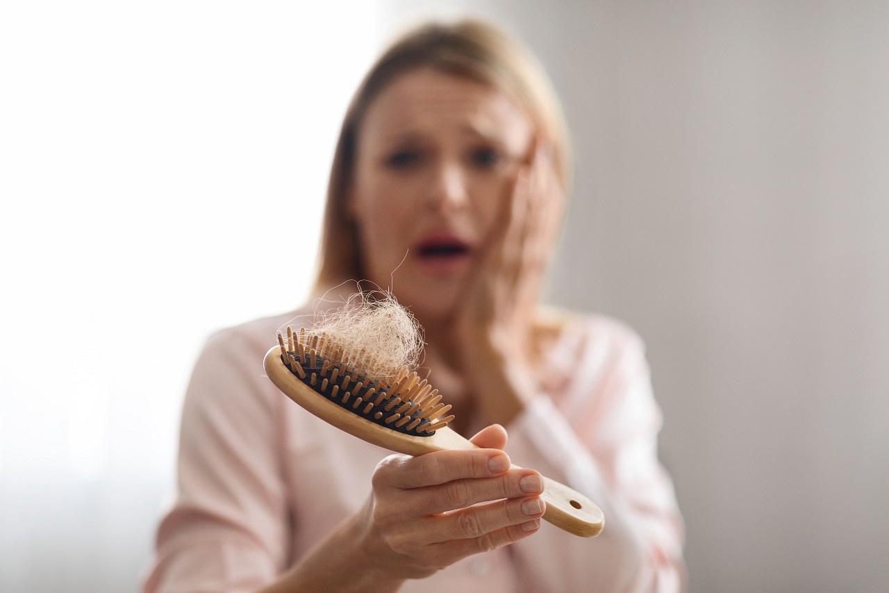 What causes female pattern hair loss? How to stop hair loss?